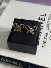 Load image into Gallery viewer, Chanel 24P Collection Ribbon GHW Earrings
