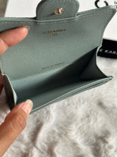Load image into Gallery viewer, Chanel Sage caviar LGHW Classic Flap Snap Card Holder
