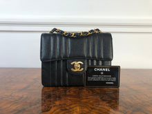 Load image into Gallery viewer, Chanel series 2 Black Caviar 24K GHW Vintage Mademoiselle Mini Flap Bag