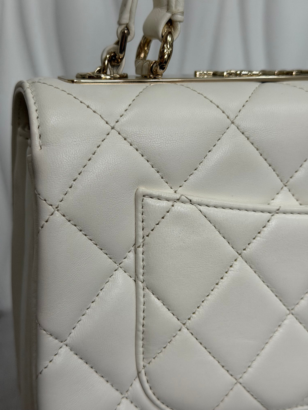 CHANEL 23S collection 2023 White Lambskin LGHW Trendy CC Flap Bag size Small with raised CHANEL Engraved Plate Top Handle