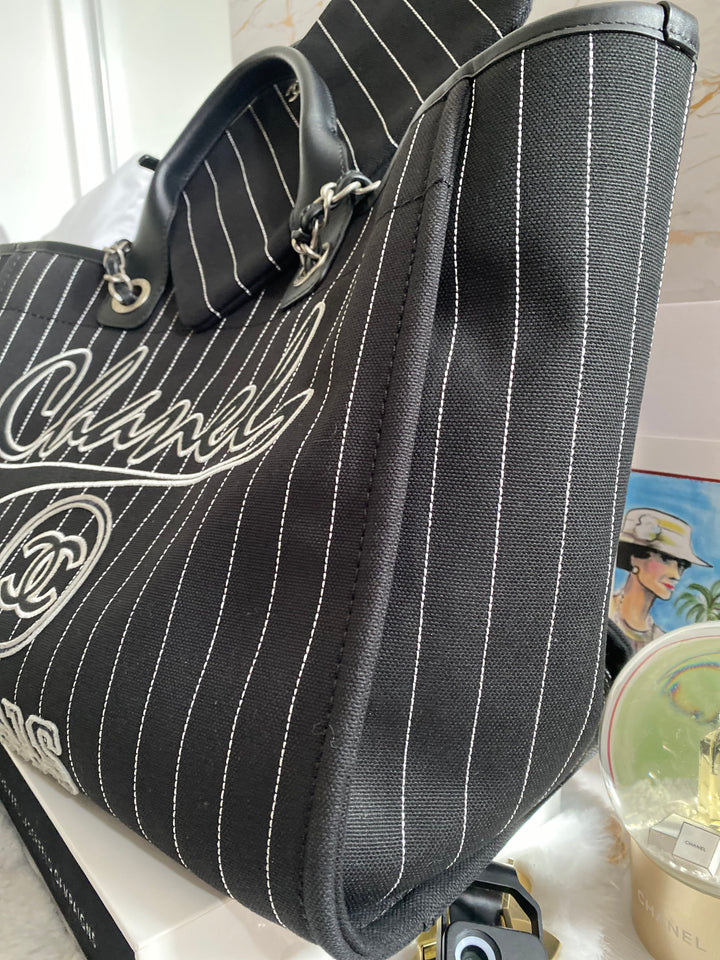 Chanel 23P 2023 collection in Black/White Stripe Canvas Deauville Tote with Top Handle and detachable pouch size Medium (15 inches)