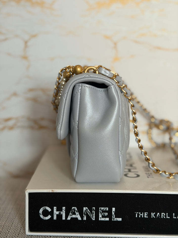 CHANEL Pearl Twist Pearly Light Blue Lambskin Mini Flap Bag 2023