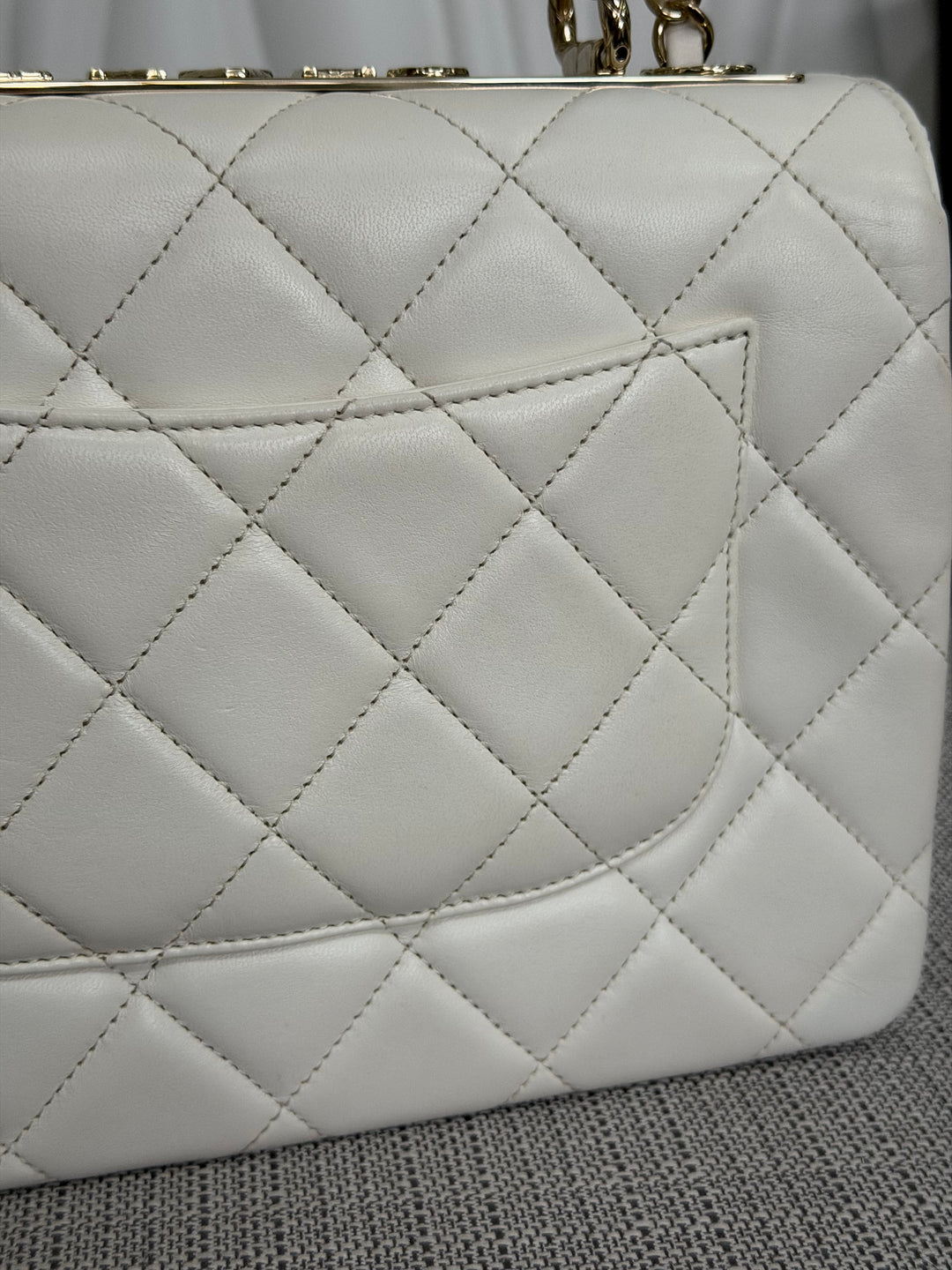 CHANEL 23S collection 2023 White Lambskin LGHW Trendy CC Flap Bag size Small with raised CHANEL Engraved Plate Top Handle