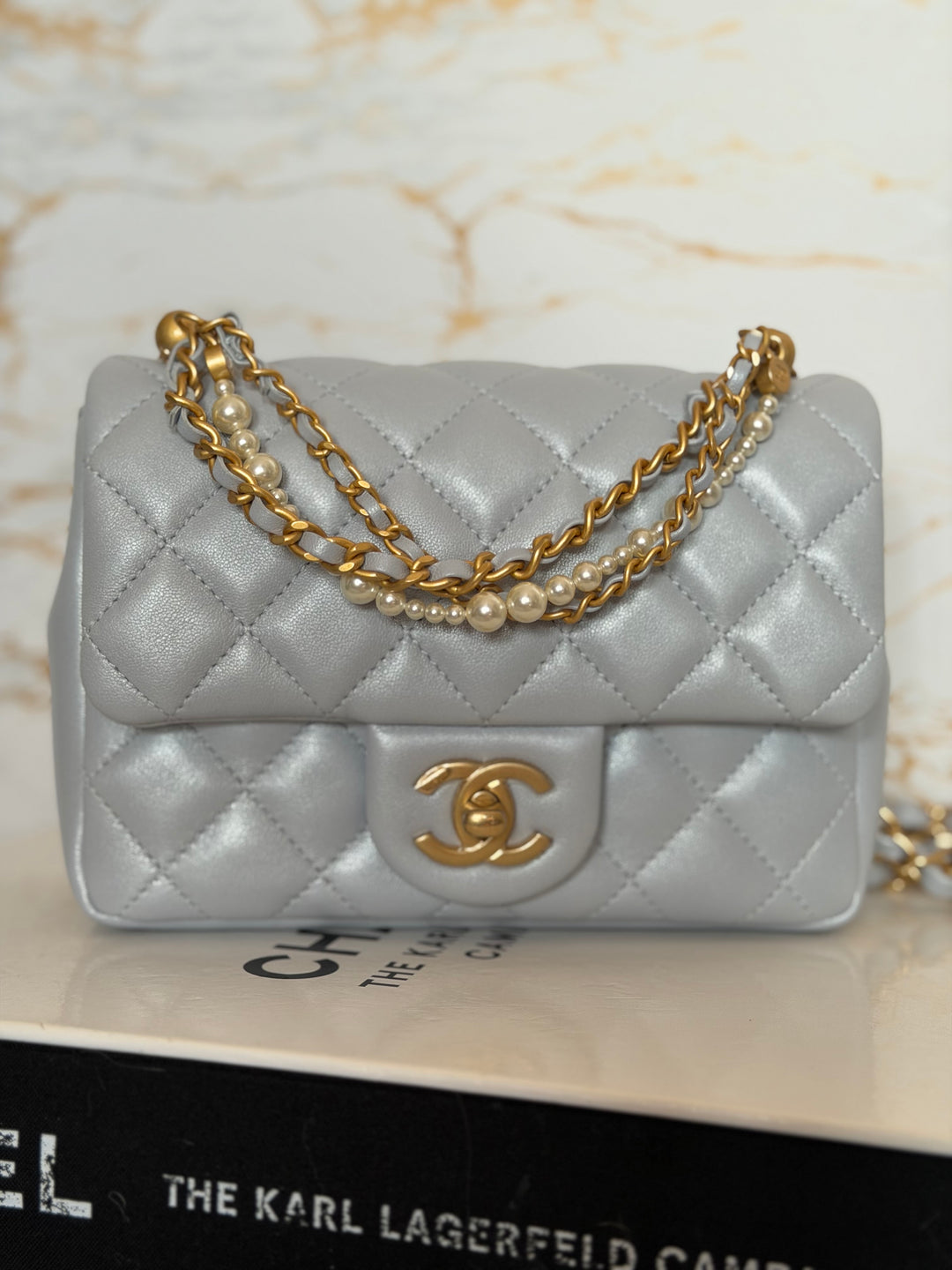CHANEL Pearl Twist Pearly Light Blue Lambskin Mini Flap Bag 2023