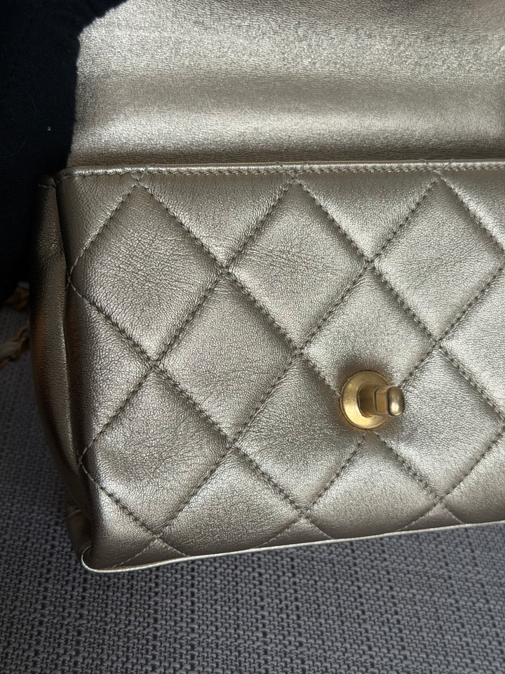 CHANEL Gold Metallic Lambskin CC Crystal Logo Chain Flap Bag 2022
