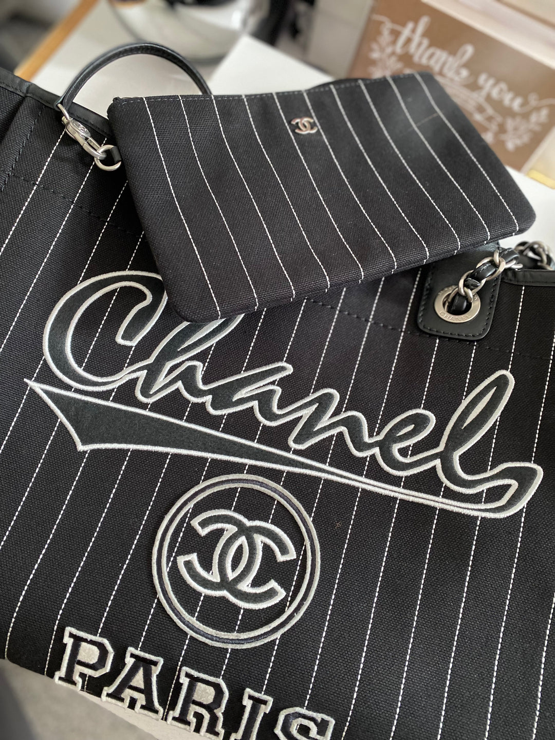 Chanel 23P 2023 collection in Black/White Stripe Canvas Deauville Tote with Top Handle and detachable pouch size Medium (15 inches)