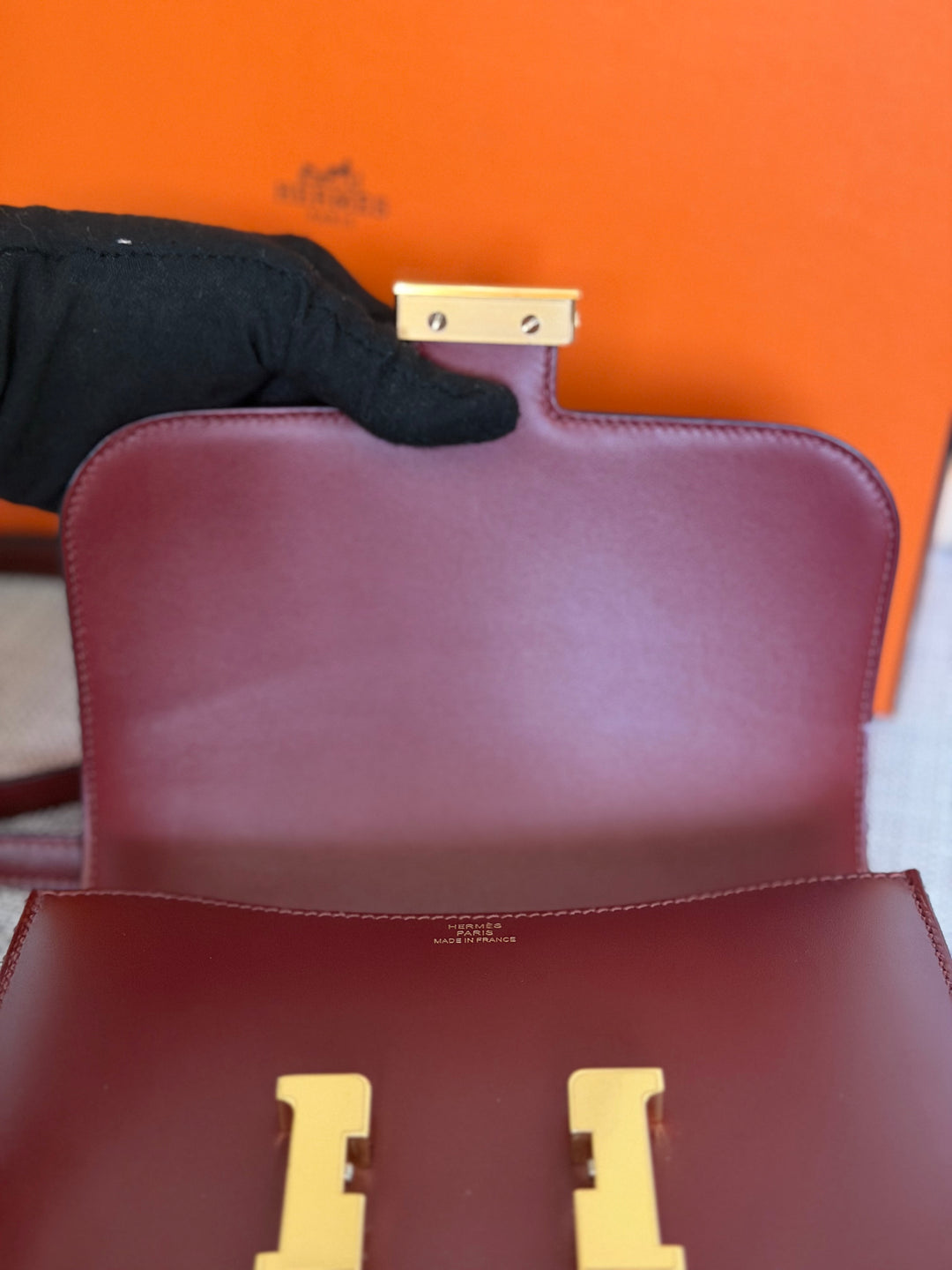 HERMÈS Rouge H Box Leather GHW Mini Constance 18 Flap Bag stamp D 2019