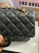 Load image into Gallery viewer, Chanel series 1 (circa 1989-1991) Black Lambskin 24K GHW Small Classic Double Flap Vintage Bag
