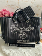 Load image into Gallery viewer, Chanel 23P 2023 Pre Spring/Summer collection in Black/White Stripe Canvas Deauville Tote with Top Handle and detachable pouch size Medium (15 inches)
