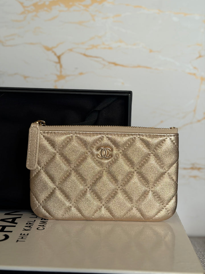 CHANEL 21P Metallic Gold Lambskin LGHW Mini O Case Pouch 15 cms