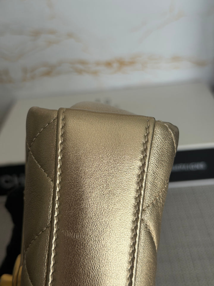 CHANEL Gold Metallic Lambskin CC Crystal Logo Chain Flap Bag 2022