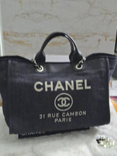 Load image into Gallery viewer, Chanel series 21 2015 Denim Deauville Tote with Leather Handle Size Medium (15 inches)
