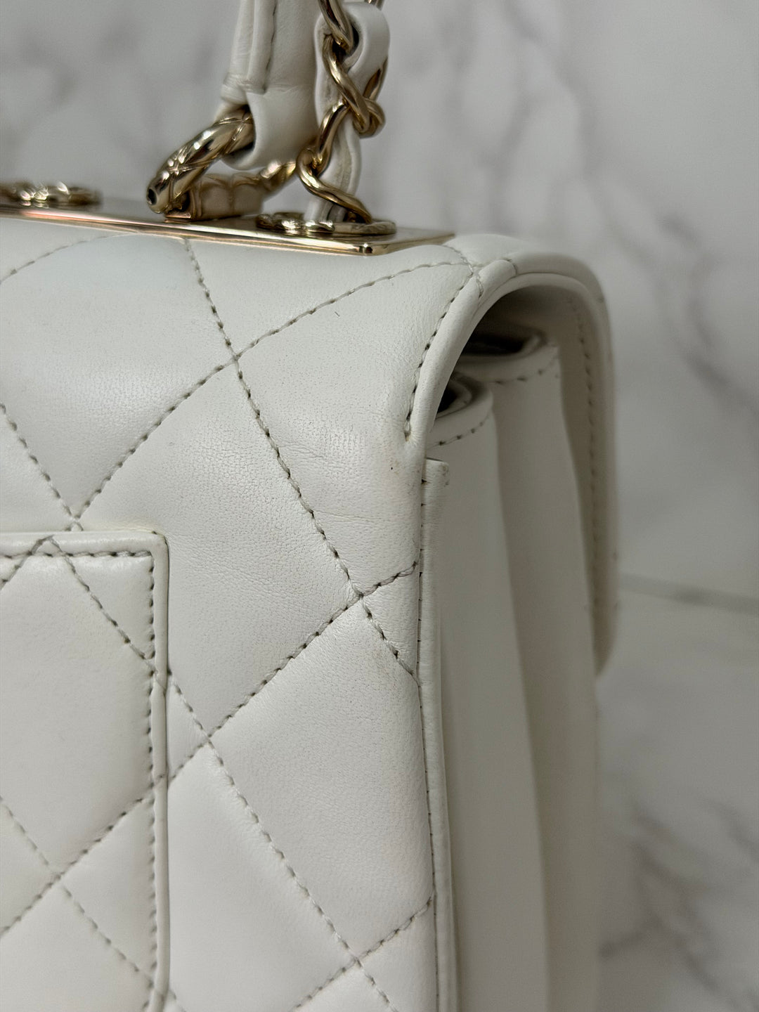 CHANEL 23S collection 2023 White Lambskin LGHW Trendy CC Flap Bag size Small with raised CHANEL Engraved Plate Top Handle