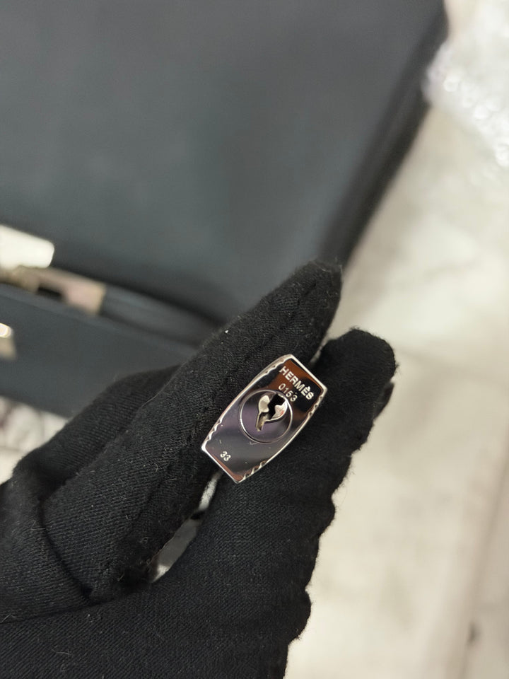 HERMES Noir Black Togo Leather with Palladium Hardware Kelly 28 Retourne Bag Stamp R 2014