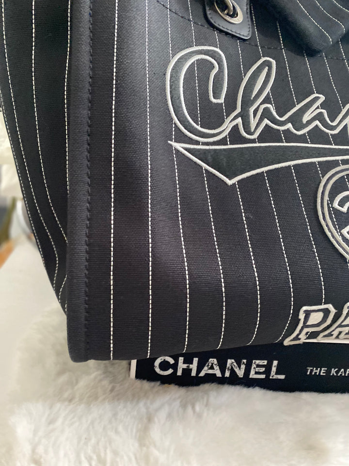 Chanel 23P 2023 collection in Black/White Stripe Canvas Deauville Tote with Top Handle and detachable pouch size Medium (15 inches)