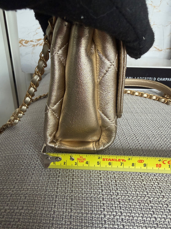 CHANEL Gold Metallic Lambskin CC Crystal Logo Chain Flap Bag 2022