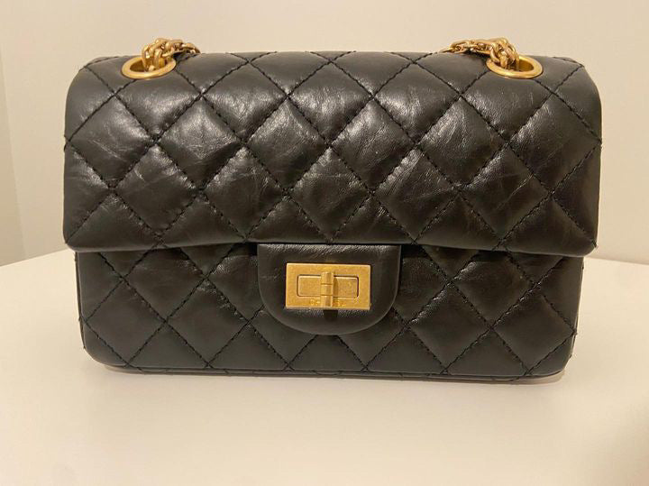 Chanel series 28 (2019) Black Calf skin Aged GHW Mini Reissue Flap Bag