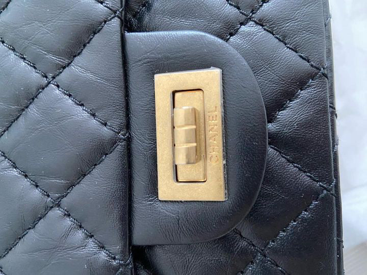 Chanel series 28 (2019) Black Calf skin Aged GHW Mini Reissue Flap Bag