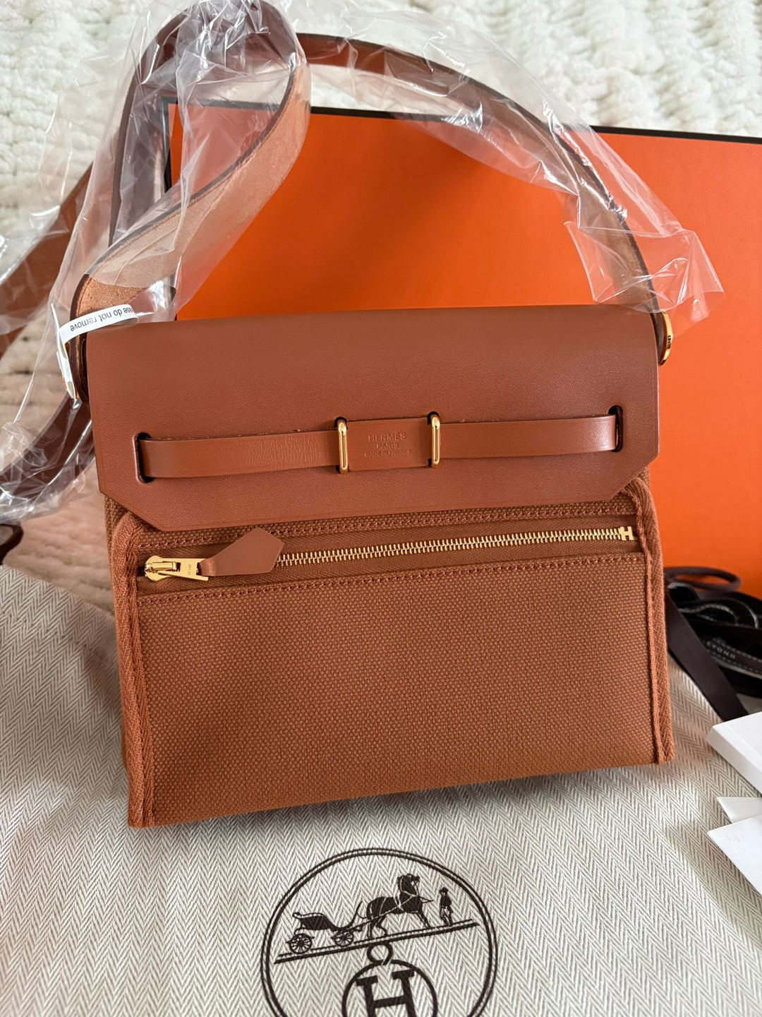 Hermès Gold Vache Hunter and Toile Mini Herbag Zip 20 Gold Hardware, 2026