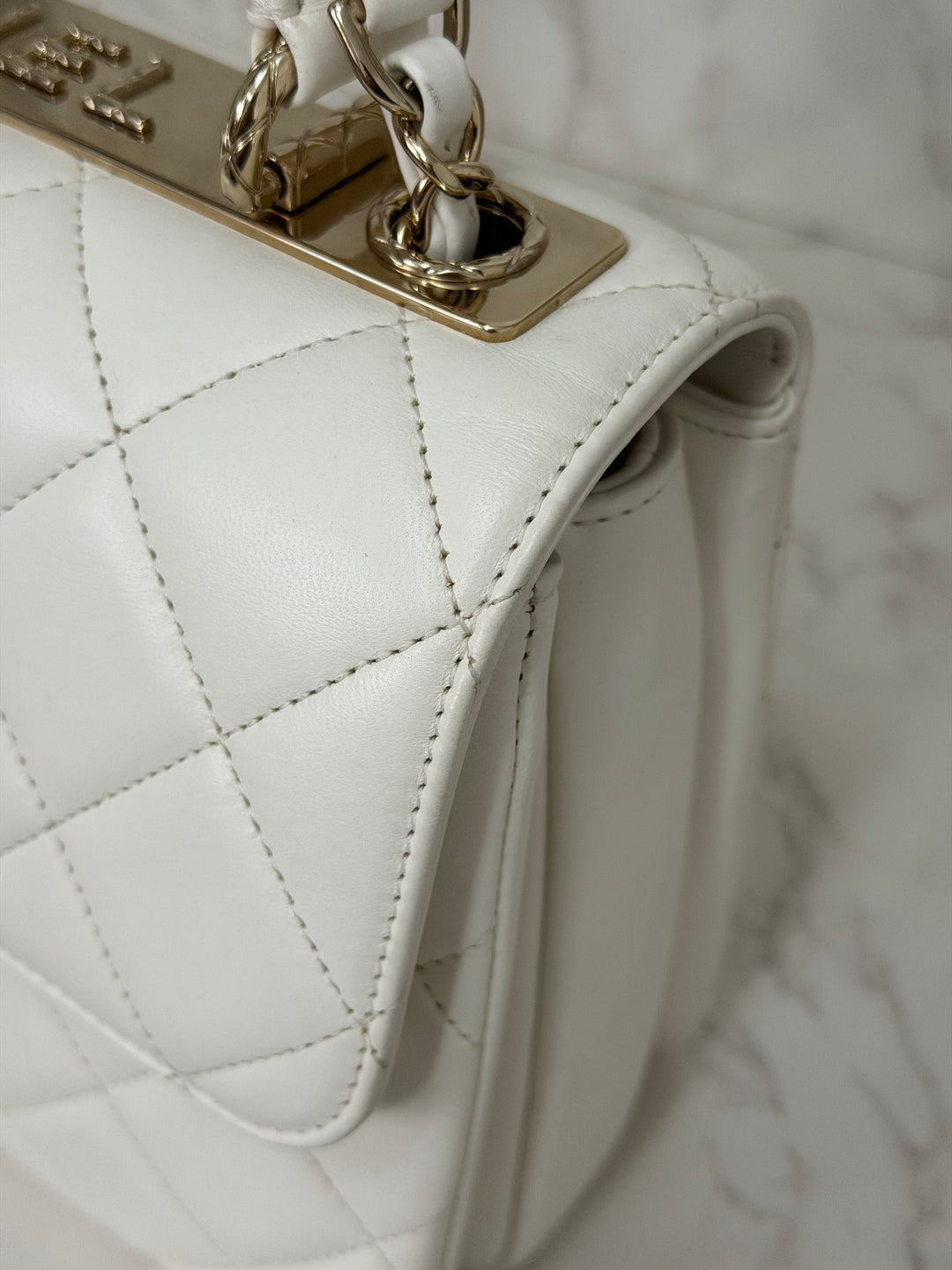 CHANEL 23S collection 2023 White Lambskin LGHW Trendy CC Flap Bag size Small with raised CHANEL Engraved Plate Top Handle