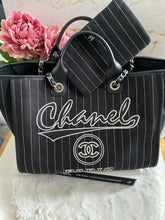 Load image into Gallery viewer, Chanel 23P 2023 Pre Spring/Summer collection in Black/White Stripe Canvas Deauville Tote with Top Handle and detachable pouch size Medium (15 inches)
