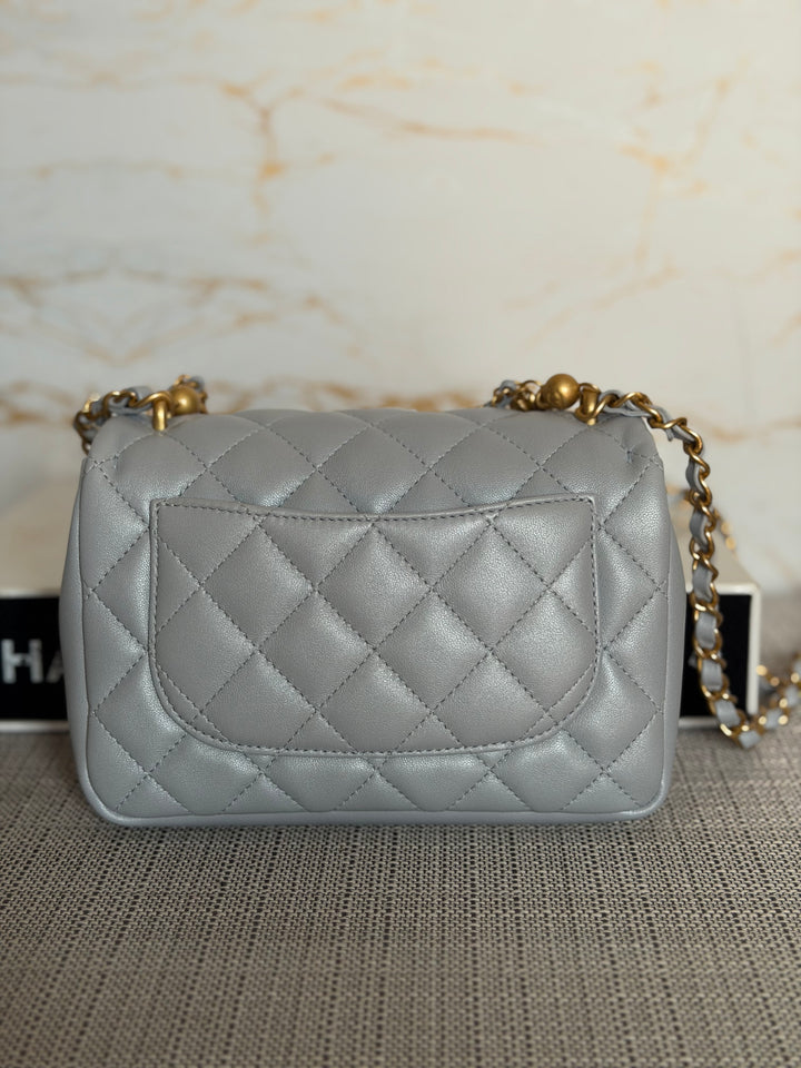 CHANEL Pearl Twist Pearly Light Blue Lambskin Mini Flap Bag 2023