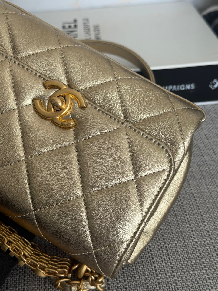 CHANEL Gold Metallic Lambskin CC Crystal Logo Chain Flap Bag 2022