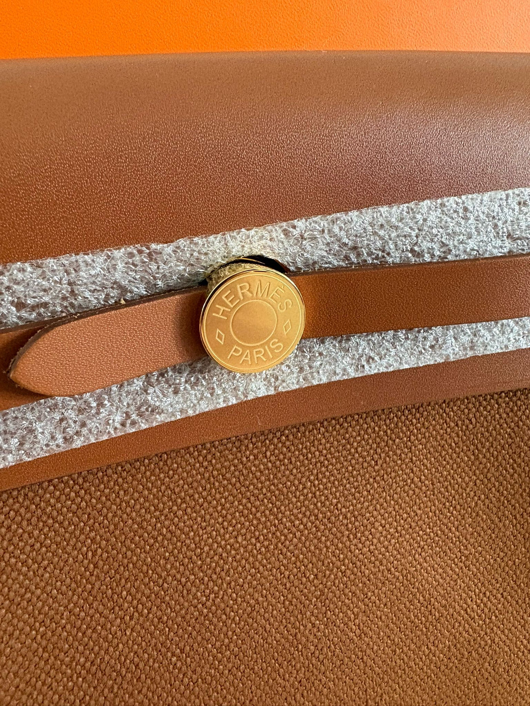 Hermès Gold Vache Hunter and Toile Mini Herbag Zip 20 Gold Hardware, 2026