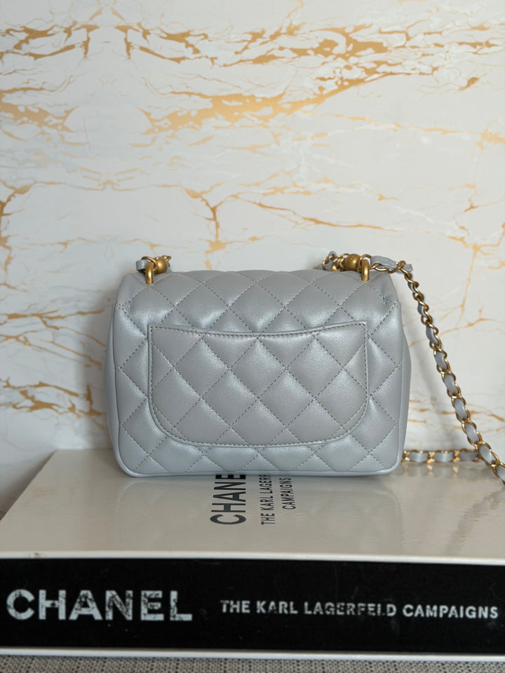 CHANEL Pearl Twist Pearly Light Blue Lambskin Mini Flap Bag 2023