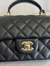 Load image into Gallery viewer, Chanel Black Lambskin Mini Rectangular Flap Bag with Top Handle and Champagne GHW
