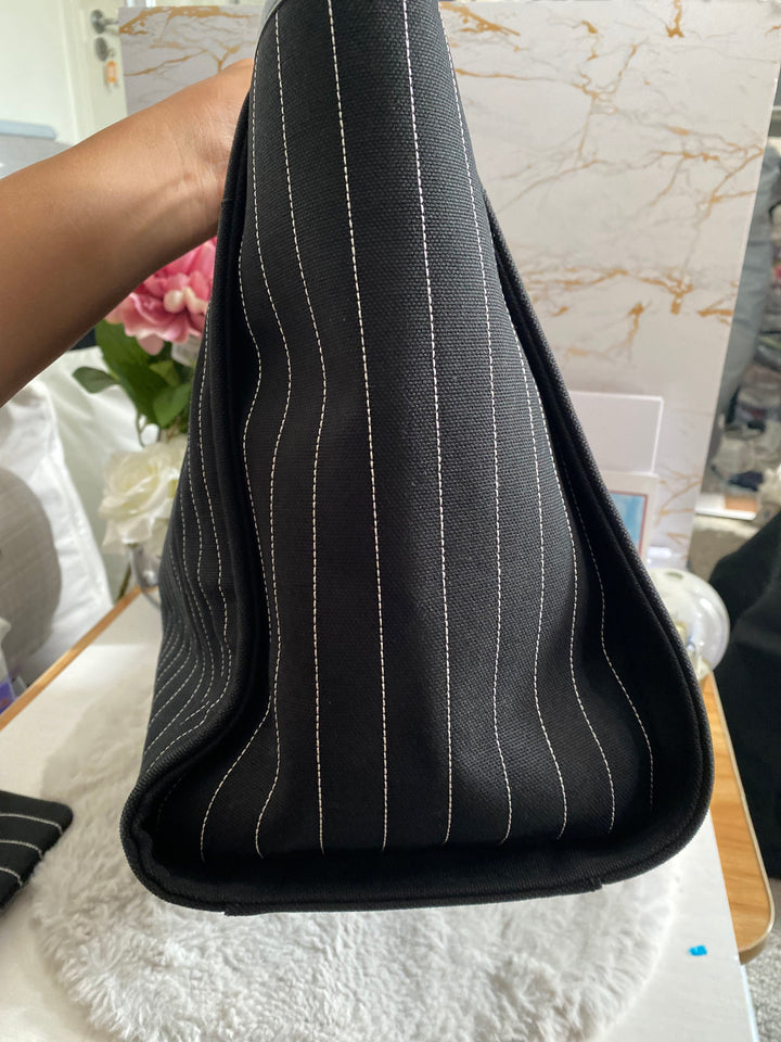 Chanel 23P 2023 collection in Black/White Stripe Canvas Deauville Tote with Top Handle and detachable pouch size Medium (15 inches)