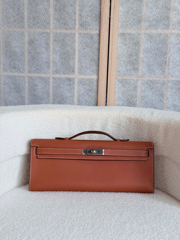HERMÈS Kelly Cut Gold Swift Leather PHW 2014 Stamp R in []