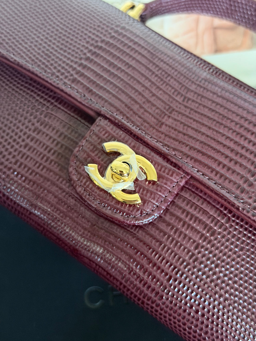 CHANEL 26A Matthieu Blazy Clutch with Top Handle in Burgundy Lizard-Embossed Calfskin with Light Gold Hardware 2026