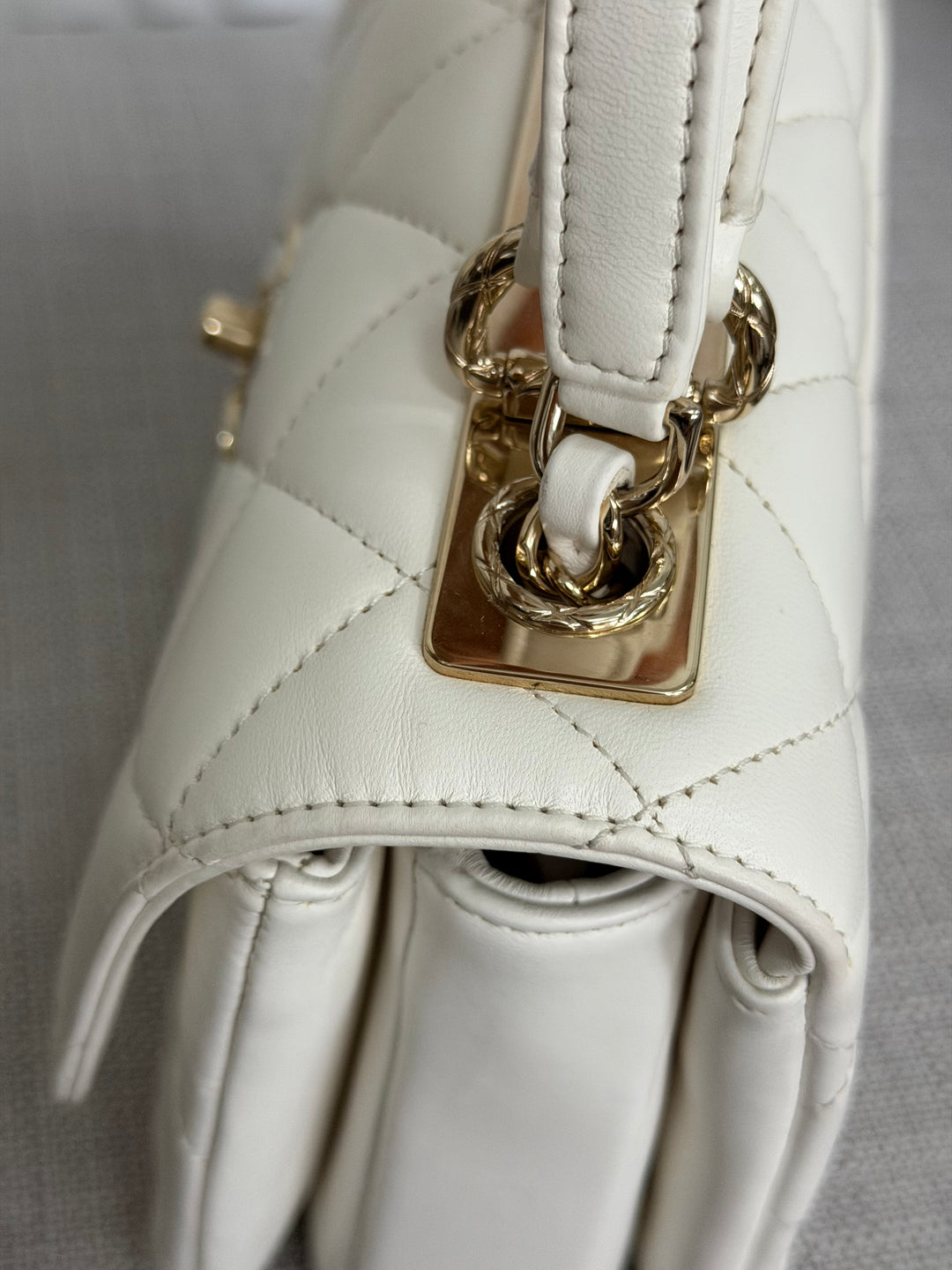 CHANEL 23S collection 2023 White Lambskin LGHW Trendy CC Flap Bag size Small with raised CHANEL Engraved Plate Top Handle