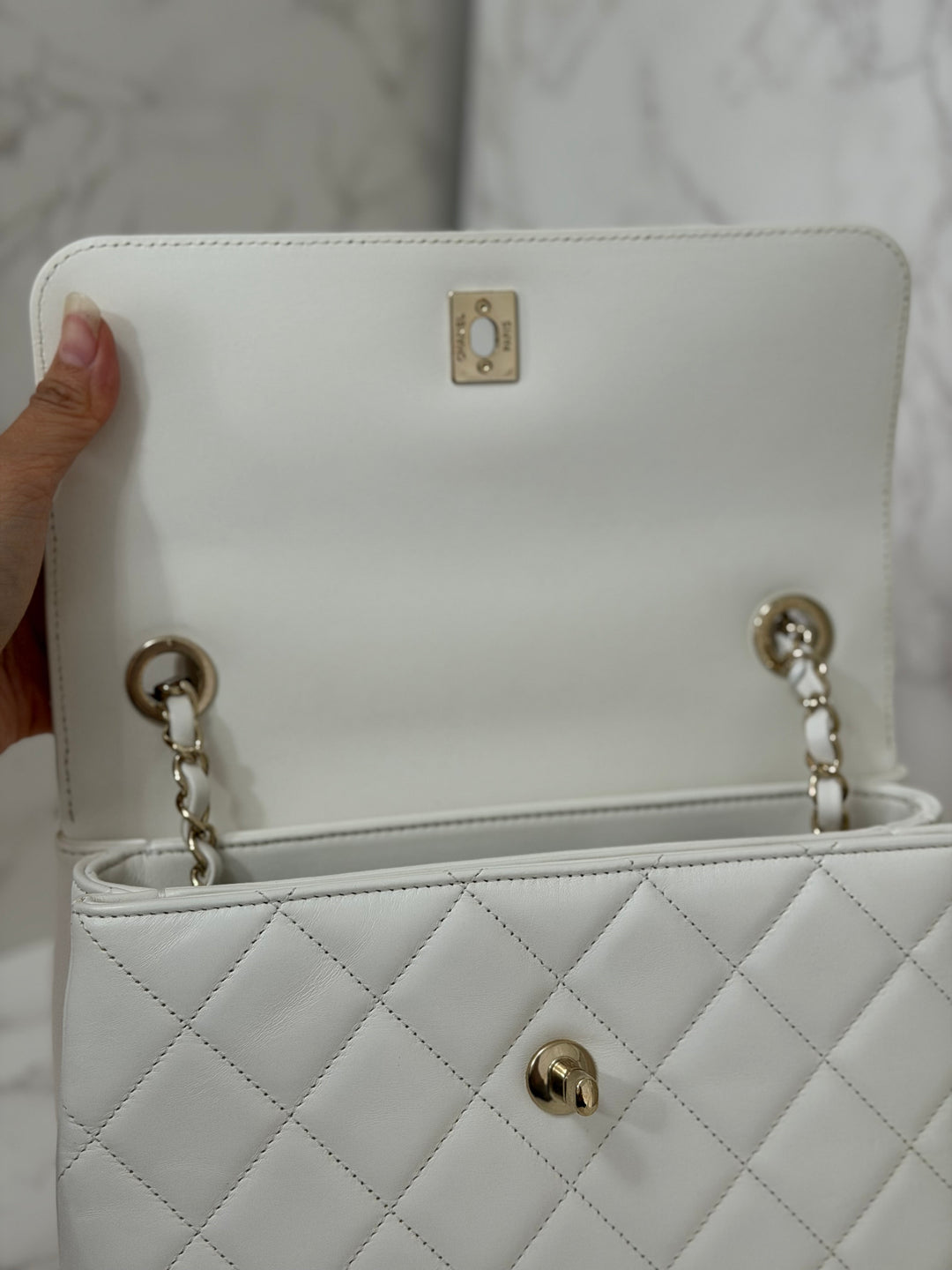 CHANEL 23S collection 2023 White Lambskin LGHW Trendy CC Flap Bag size Small with raised CHANEL Engraved Plate Top Handle
