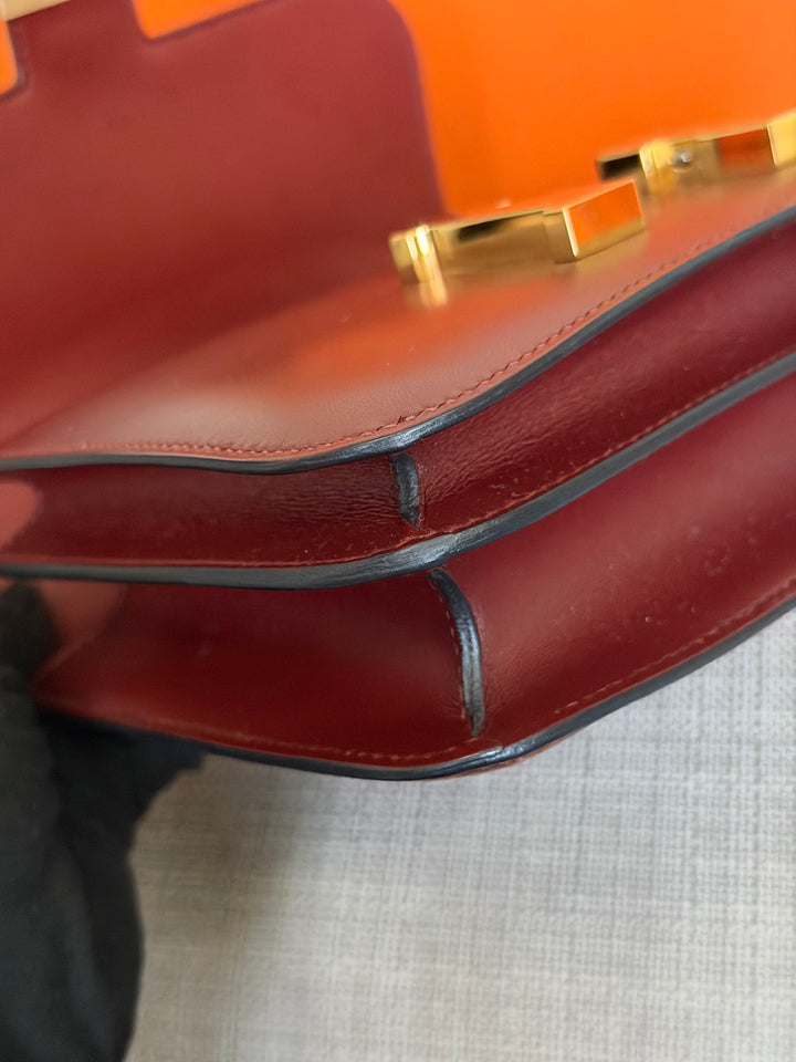 HERMÈS Rouge H Box Leather GHW Mini Constance 18 Flap Bag stamp D 2019