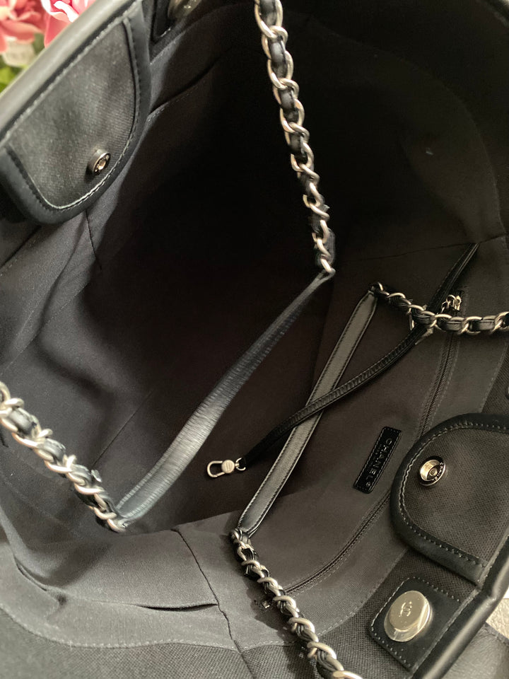 Chanel 23P 2023 collection in Black/White Stripe Canvas Deauville Tote with Top Handle and detachable pouch size Medium (15 inches)