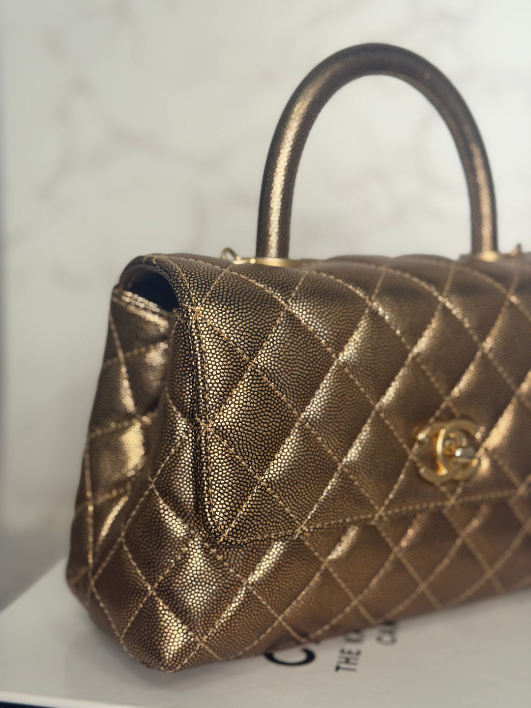 CHANEL series 28 19A Metallic Bronze Gold Caviar Aged GHW Coco Handle Flap Bag size SMALL with detachable shoulder strap 2019