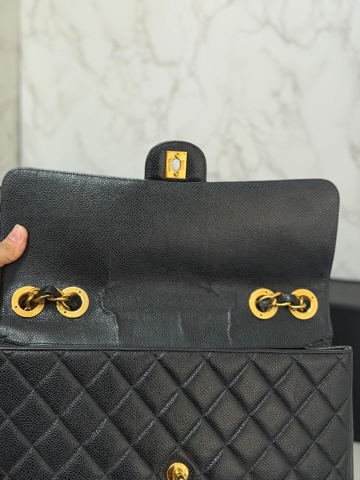 Chanel Series 7 24K GHW Black Caviar Vintage Jumbo Single Flap Bag 2008/2009