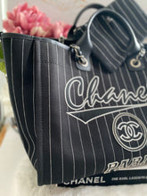 Load image into Gallery viewer, Chanel 23P 2023 Pre Spring/Summer collection in Black/White Stripe Canvas Deauville Tote with Top Handle and detachable pouch size Medium (15 inches)
