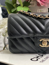 Load image into Gallery viewer, Chanel series 26 (2018) Black Lambskin Chevron LGHW Mini rectangular Flap Bag
