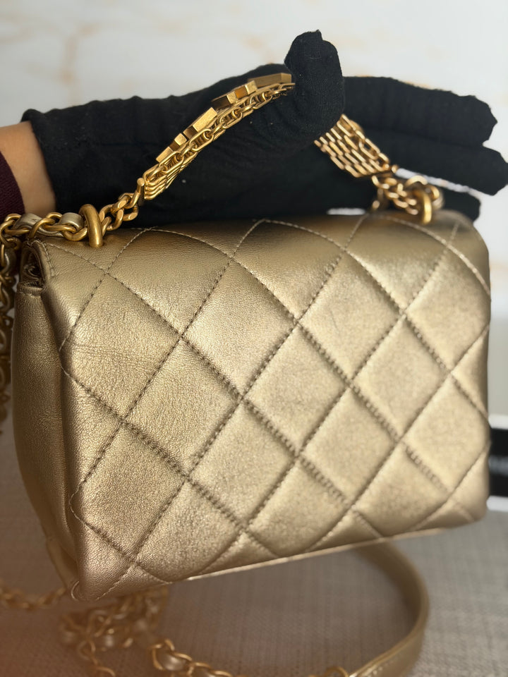 CHANEL Gold Metallic Lambskin CC Crystal Logo Chain Flap Bag 2022