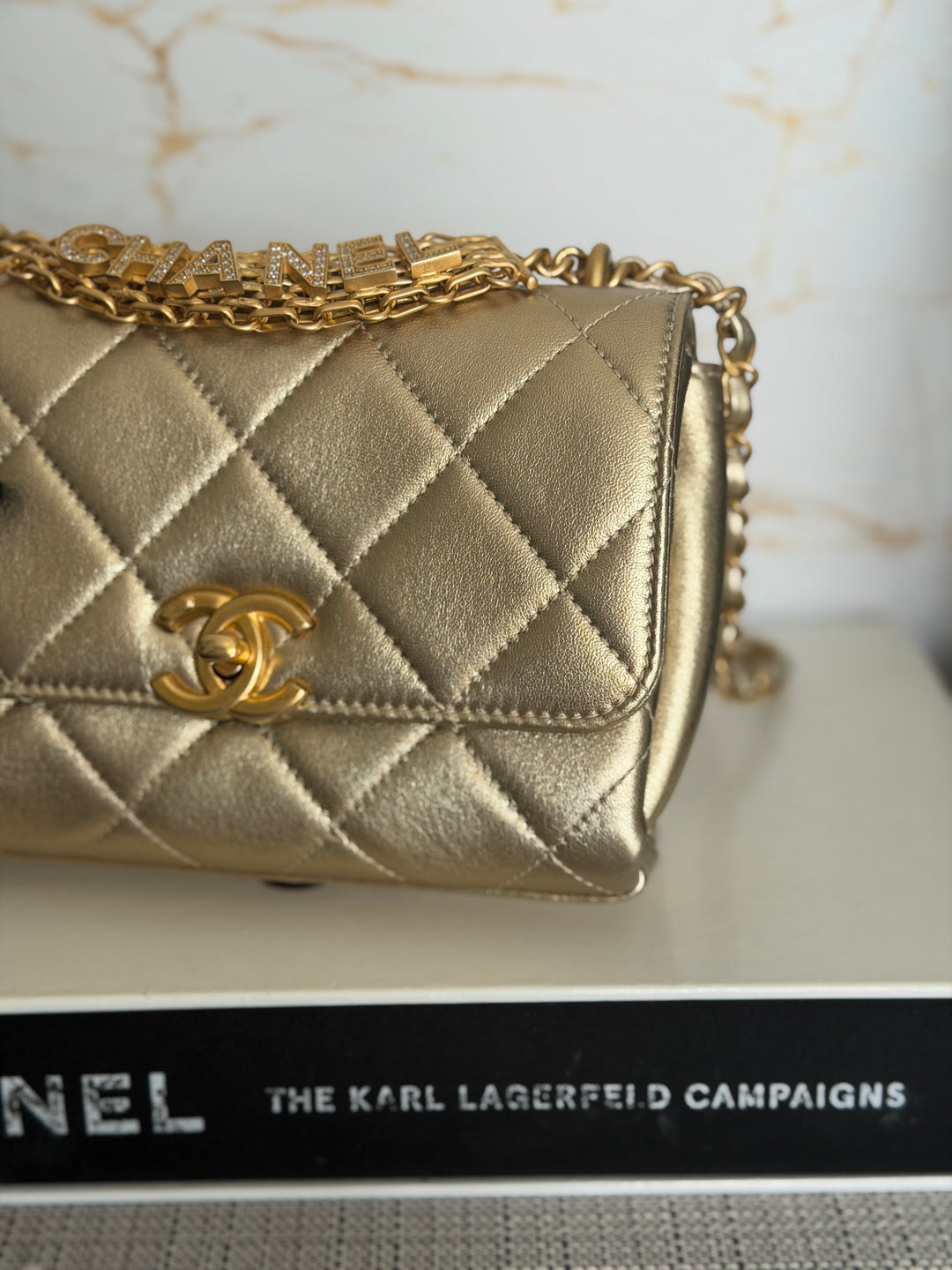 CHANEL Gold Metallic Lambskin CC Crystal Logo Chain Flap Bag 2022
