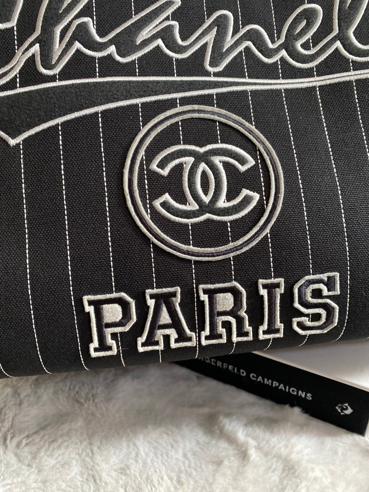 Chanel 23P 2023 collection in Black/White Stripe Canvas Deauville Tote with Top Handle and detachable pouch size Medium (15 inches)
