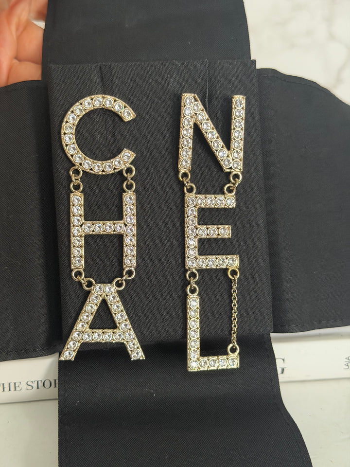 CHANEL Diamanté Letter Statement Earrings in Gold and Crystals