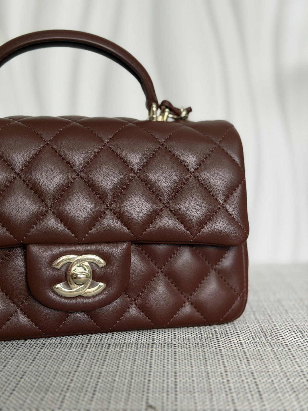 CHANEL 25K collection 2025 Brown Lambskin LGHW Mini Rectangular Flap Bag with Leather Top Handle