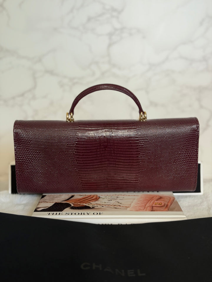 CHANEL 26A Matthieu Blazy Clutch with Top Handle in Burgundy Lizard-Embossed Calfskin with Light Gold Hardware 2026