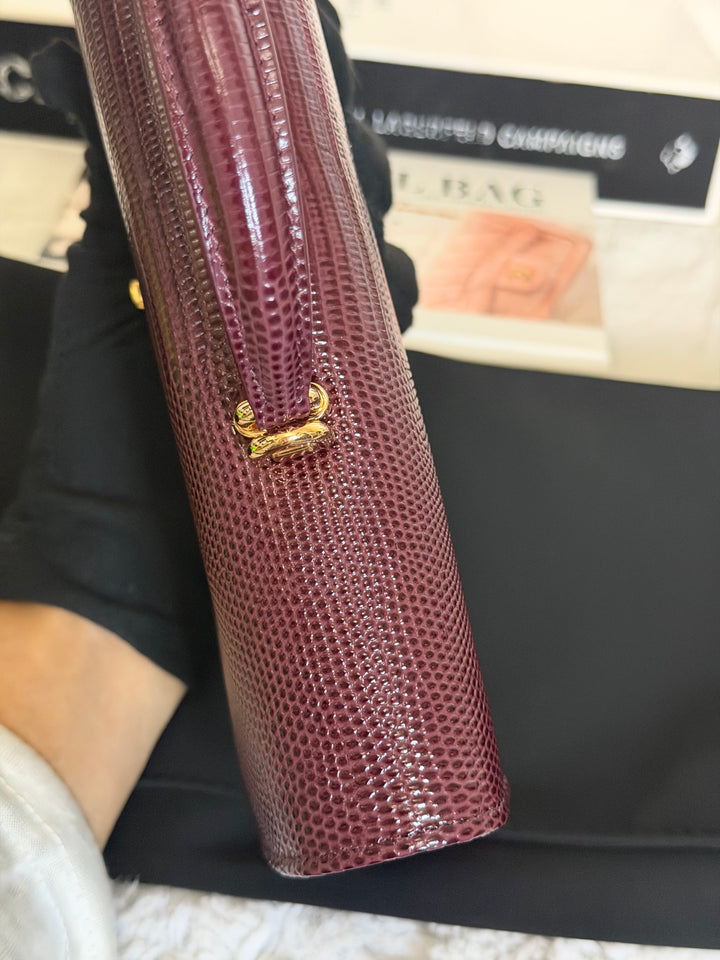 CHANEL 26A Matthieu Blazy Clutch with Top Handle in Burgundy Lizard-Embossed Calfskin with Light Gold Hardware 2026