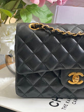 Load image into Gallery viewer, Chanel series 1 (circa 1989-1991) Black Lambskin 24K GHW Small Classic Double Flap Vintage Bag
