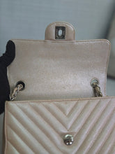 Load image into Gallery viewer, Chanel series 24 17B 2017 Fall/Winter Collection Iridescent Rose Gold Caviar Silver hardware Chevron Mini Rectangular Flap Bag
